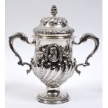 A late 18th century Irish silver two handled trophy cup, with a (later) presentation inscription