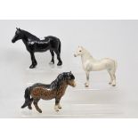 A Beswick Dales Pony, 1671, a Welsh Mountain Pony, 2nd version, 1643, and a Woolly Shetland Mare,