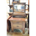 An Arts and Crafts oak dressing table, 91 cm wide, and a pedestal desk (2) Report by GH Both with