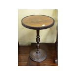 An occasional table, with a rosewood top, 35 cm diameter, other tables, chairs, lamps, a mirror,