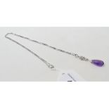 An 18ct white gold, amethyst and diamond pendant, on an 18ct white gold chain Report by NG It is