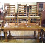 A Brights of Nettlebed oak refectory style dining table, 199 cm wide, and six matching ladder back