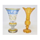 A Bohemian amber glass trumpet vase, of hexagonal form, with etched decoration, 24.5 cm high, and
