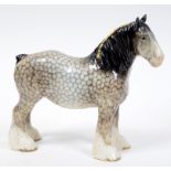 A Beswick Shire Mare, rockinghorse grey, 818, front left leg and ears restored, gloss See