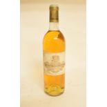 A bottle of Chateau Coutet a Barsac Sauterne, 1974, eleven other bottles of wine, and a bottle of