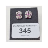 A pair of Art Deco style 9ct gold, ruby and diamond stud earrings Report by NG Modern