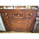 A mahogany chest, having an arrangement of eight drawers, on bracket feet, 122 cm wide