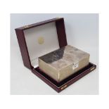 A silver presentation casket, the top decorated a map of Qatar, Grant MacDonald, London 1989, 20