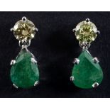 A pair of diamond and emerald drop earrings, in a white coloured metal setting See illustration