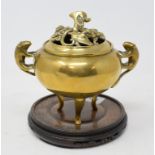 A Chinese brass censer and cover, of compressed circular form, the cover pierced mice amongst