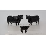 A Beswick Aberdeen Angus Bull, 1562, chip to one hoof and glaze fault to tail, an Aberdeen Angus