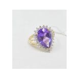 A 9ct gold, pear cut amethyst and diamond cluster ring, approx. ring size KÂ½ Report by NG Modern