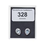 A pair of 18ct white gold, pear shaped aquamarine and diamond stud earrings