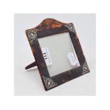 A tortoiseshell mounted strut photograph frame, 14.5 cm high New strut/backing, glass chip to
