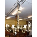 A brass eight light chandelier, 72 cm wide