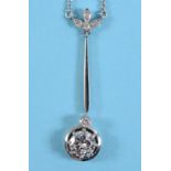 An Edwardian diamond pendant, the central trefoil with shaped suspension to a large solitaire