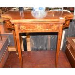 An Edwardian card table, inlaid with ribbon ties, swags and foliage, on tapering square legs, 76