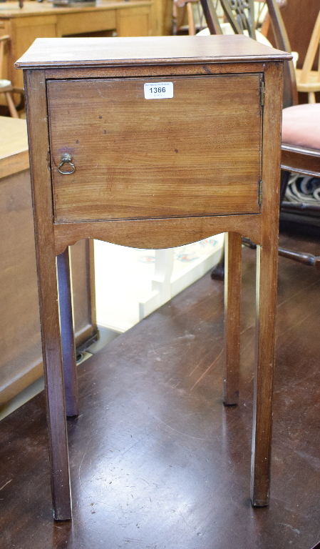 A bedside cabinet, with single panel door, on square legs, 36 cm wide