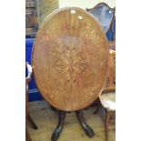 A Victorian walnut loo table, with inlaid decoration, 72 cm wide and a bookcase (2)