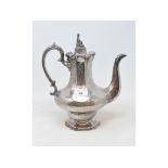 A Victorian silver plated coffee pot, with a Chinaman finial holding a pipe and with engraved