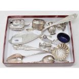 A silver coloured metal fish slice, and assorted small items of silver