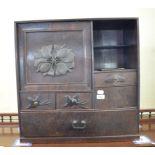 A Korean elm table top cabinet, comprising a cupboard and an arrangement of drawers and pigeon