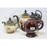 An early 19th century Brameld Cadogan teapot, 16 cm high, and four Victorian self pouring type