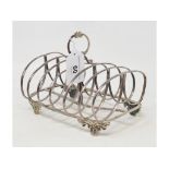 A Victorian silver six division toast rack, initialled, London 1850, approx. 7.7 ozt, 11 cm high