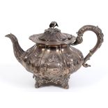 A Victorian silver teapot, embossed flowers and foliage, London 1840, approx. 26.2 ozt, 17 cm
