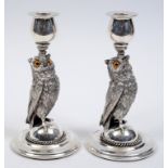 A pair of Victorian silver plated candlesticks, in the form of owls, with glass eyes, 20 cm high (2)