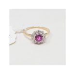 An 18ct gold, platinum, ruby and diamond cluster ring, approx. ring size N Report by NG It is