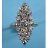 An 18ct gold and diamond ring, the marquise panel set 21 stones, approx. ring size M See