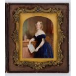 English school, 19th century, a three quarter length portrait miniature of a girl in a velvet