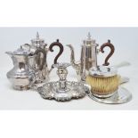A silver plated two piece cafÃ© au lait set, a silver plated chamberstick, and other plated items (