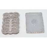 A Victorian silver card case, with engine turned decoration, monogrammed, Birmingham 1889, and a