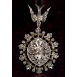 A 19th century diamond pendant/brooch, the swallow pendant suspension, in a fitted box See