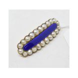 A blue enamel and half pearl brooch, inscribed verso Report by NG Approx. 14.1 g (all in) and