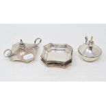 A silver oil lamp, with four matching dishes, Birmingham 1931, and another similar lamp, Hukin &