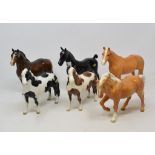 A Beswick Pinto Pony, 1st version, piebald, 1373, another, 2nd version, skewbald, a Hackney Horse,