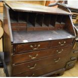 A mahogany bureau, crossbanded, the fall flap detached, 96 cm wide