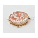 A 15ct gold shell cameo, carved a classical scene