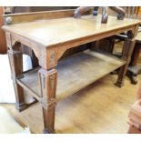 A Victorian pollard oak serving table with Gothic carved decoration, 151 cm wide