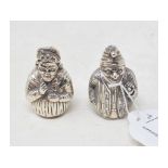 A pair of novelty silver cruets, in the form of Punch and Judy, Punch 5 cm high (2) Report by NG