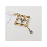 A 15ct gold, sapphire and seed pearl pendant
