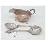 A silver sauce boat, Birmingham 1933, and a pair of 18th century style silver spoons, approx. 10.0