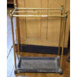 A brass eight division stick stand, 41 cm wide