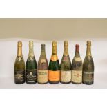 A bottle of Veuve Clicquot N V, and four other bottles (5)