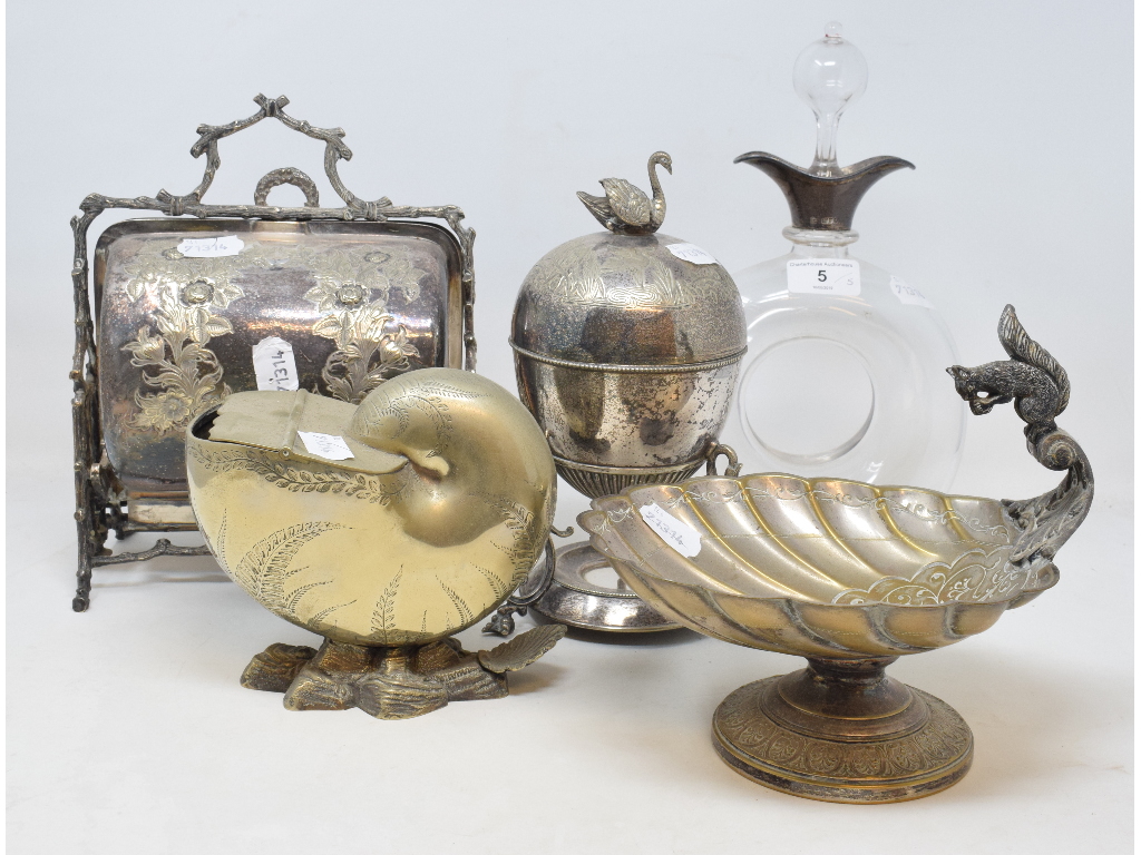 A Victorian plated spoon warmer, in the form of a shell, an egg coddler, a biscuiteer, a pedestal