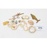 A 14ct gold and paste set ring, another ring, a butterfly bar brooch, and other items