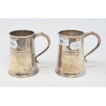 A pair of silver tankards, Birmingham 1966, approx. 13.4 ozt, 10.5 cm high (2) Report by GH One of